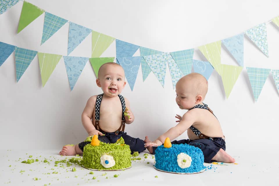 Twin Baby Boys eating cake at a Cake Smash photo session with Colleen Hight