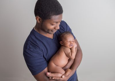 Newborn Baby Boy with Daddy in Suwanee, Georgia Studio of Colleen Hight Photography